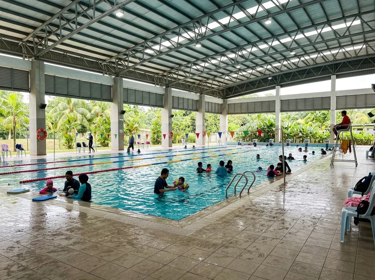 People enjoying indoor swimming pool, covered facility, family recreation.