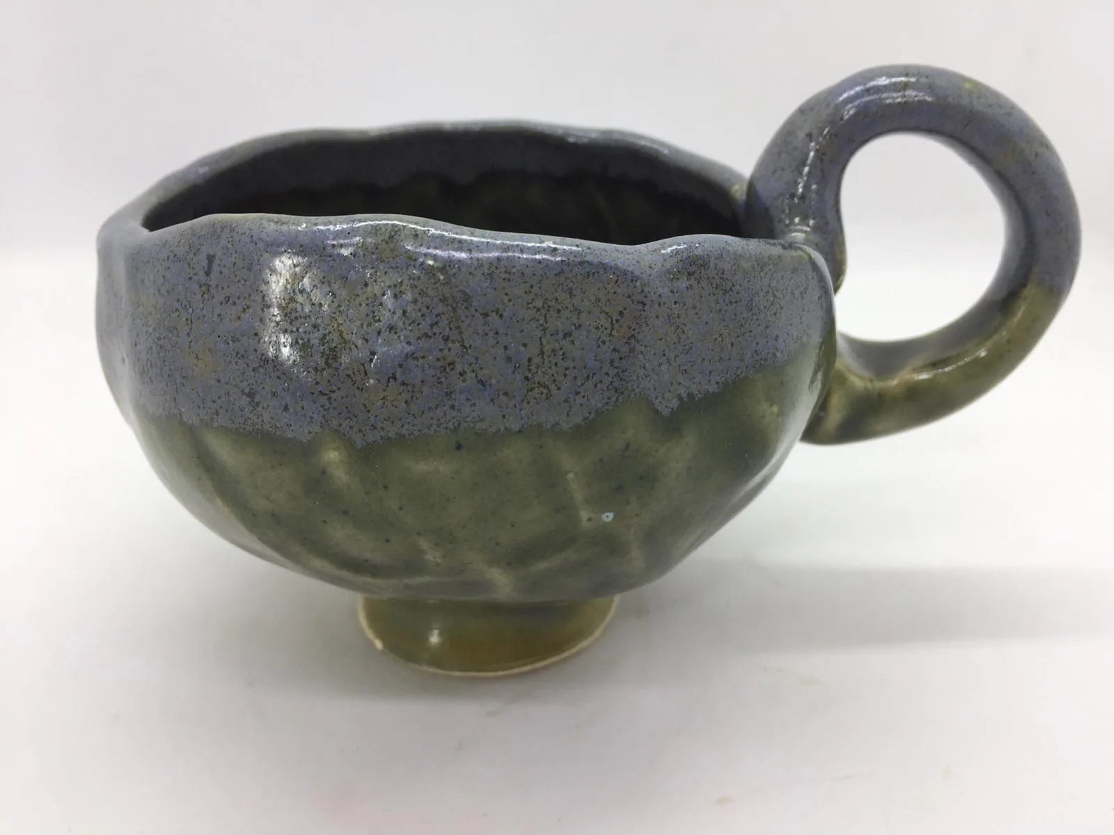 Handmade ceramic mug with grey-blue and olive-green glaze