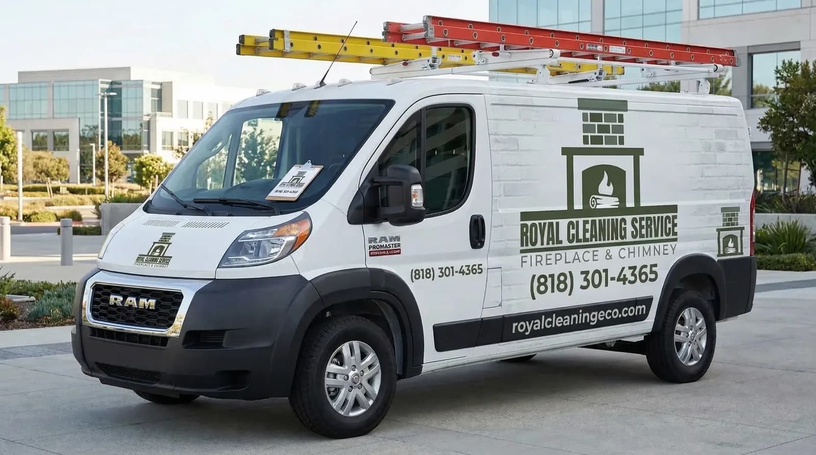 Royal Cleaning Service work van with equipment rack on roof in commercial parking area